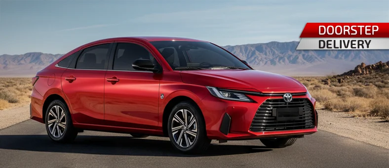 Silver Toyota Yaris sedan available for monthly car hire in Dubai via Selfdrive