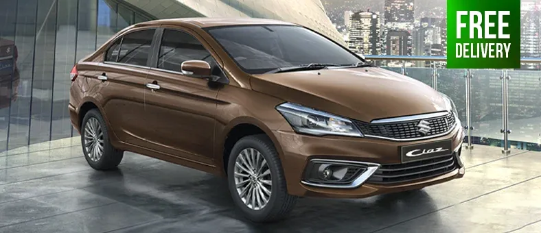 Brown Suzuki Ciaz sedan – rent it with Selfdrive for daily or monthly plans across major UAE airports.